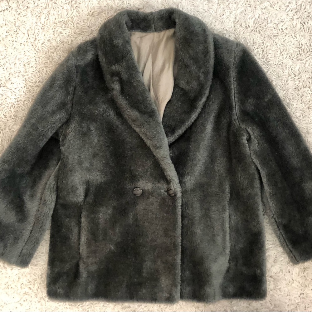 Faux fur. Great warmth. From good old sears